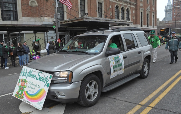 The Holy Name Society of St. Benedict's Church heads North on Delaware Avenue during the annual St. Patrick's Day Parade. (Dan Cappellazzo/Staff Photographer)
